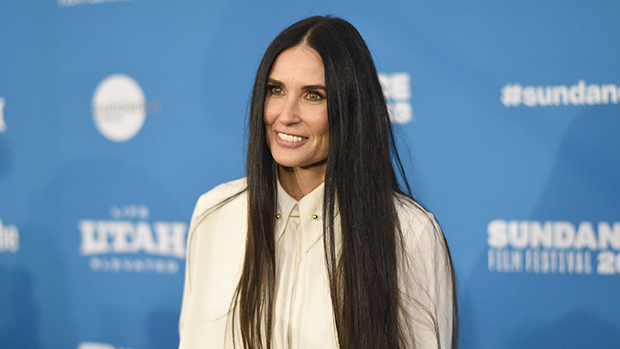 Demi Moore, 61, flashes a leg in her winter suit with high heels while ...