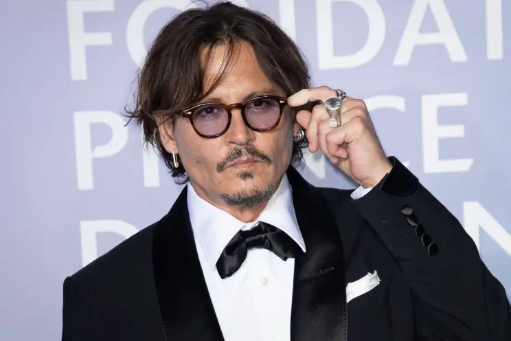Johnny Depp is romantically involved with one of the lawyers who was ...